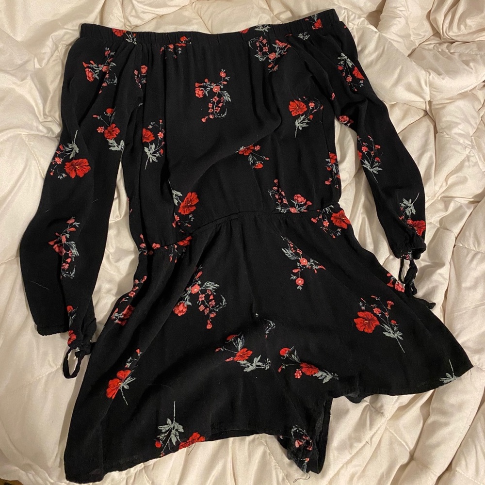 Black romper with roses all over